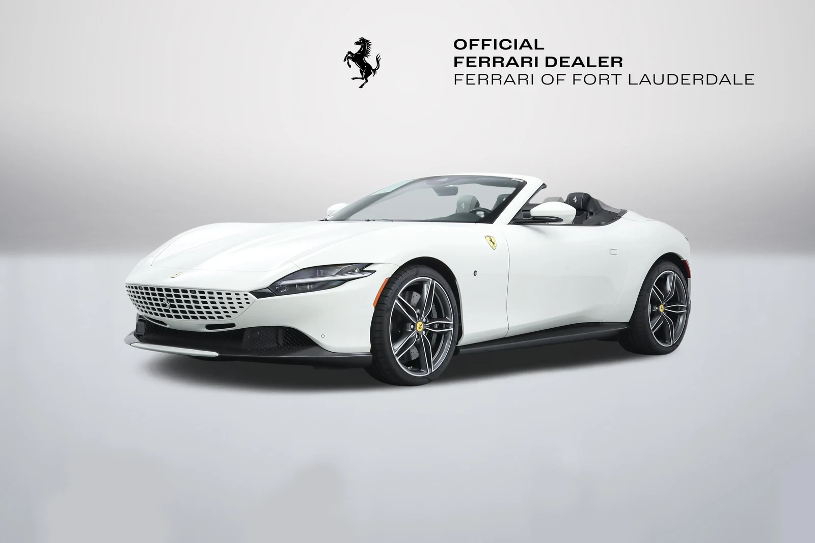 Bianco Avus Ferrari Roma Spider in a front three-quarter view