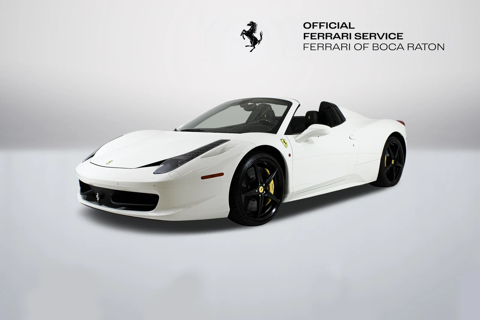 Bianco Avus Ferrari 458 Spider in a front three-quarter view