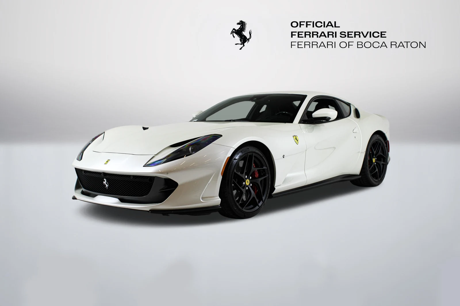 Bianco Fuji Ferrari 812 Superfast in a front three-quarter view