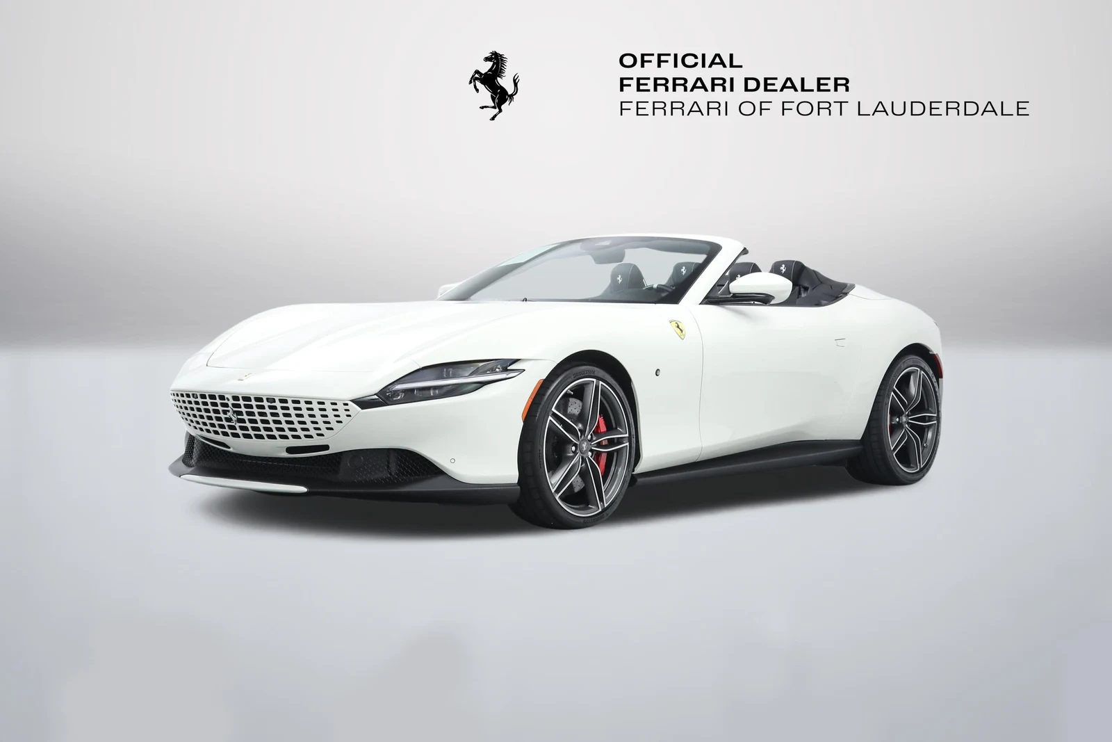 Bianco Avus Ferrari Roma Spider in a front three-quarter view