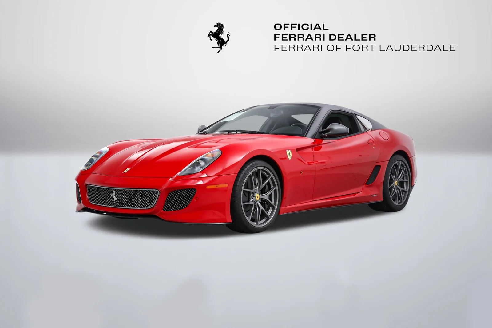 Rosso Corsa Ferrari 599 GTO in a front three-quarter view