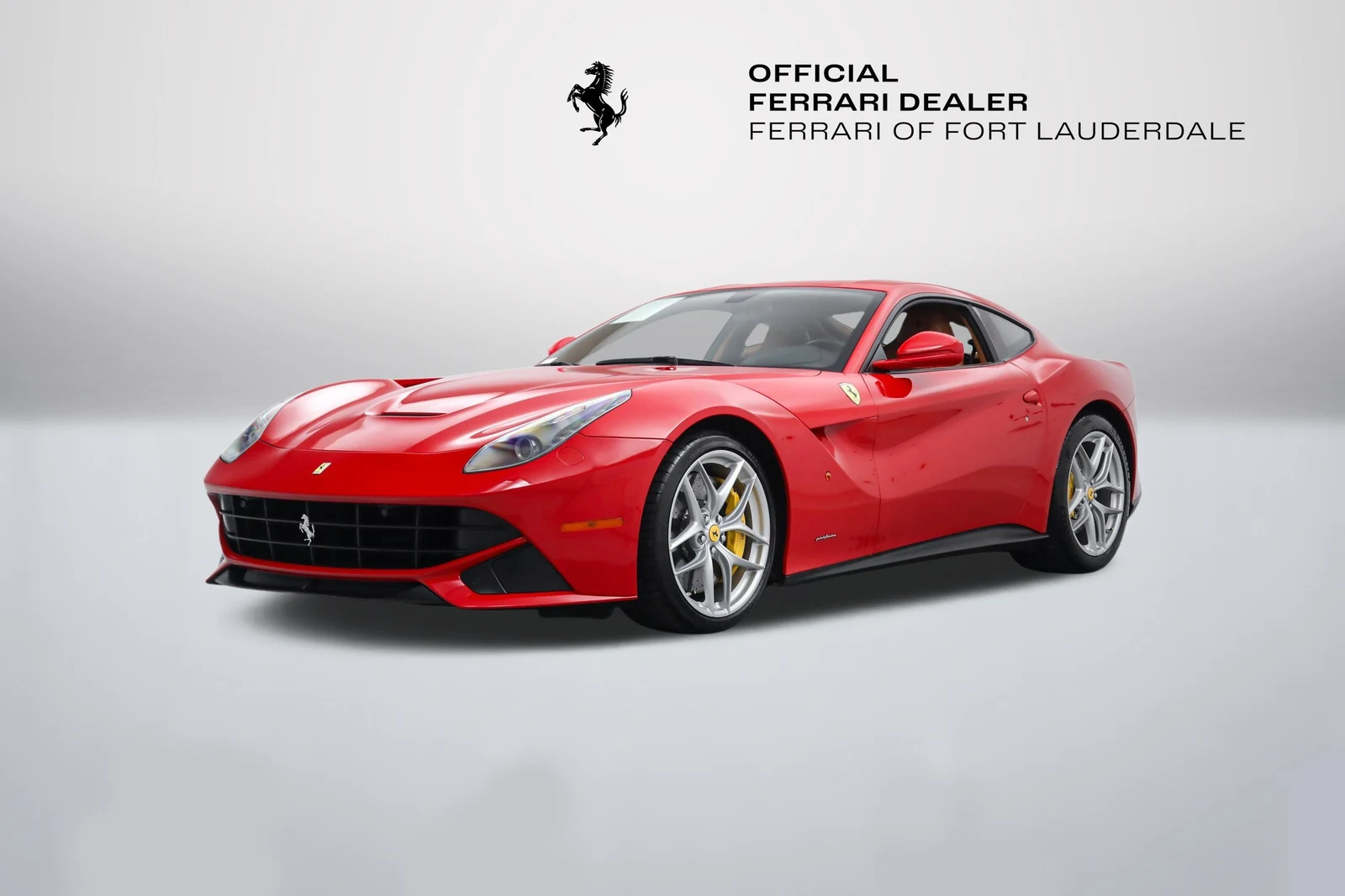 Rosso Corsa Ferrari F12berlinetta in a front three-quarter view