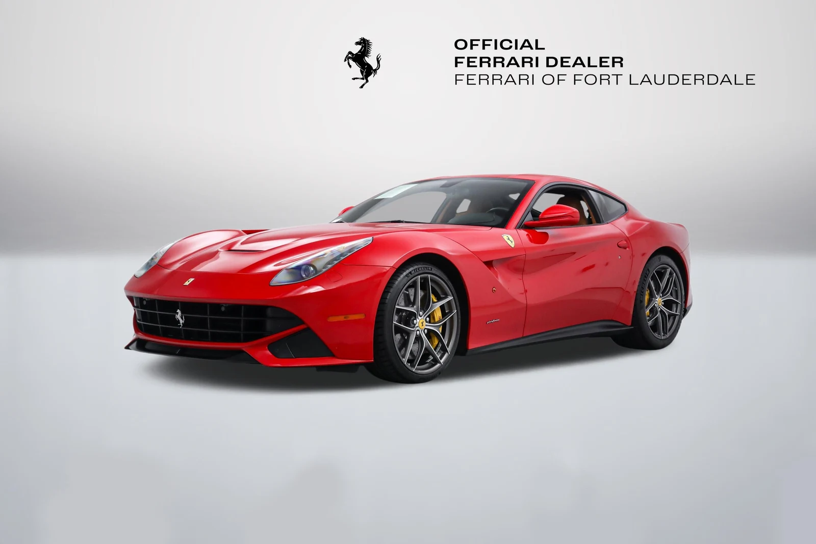 Rosso Corsa Ferrari F12berlinetta in a front three-quarter view