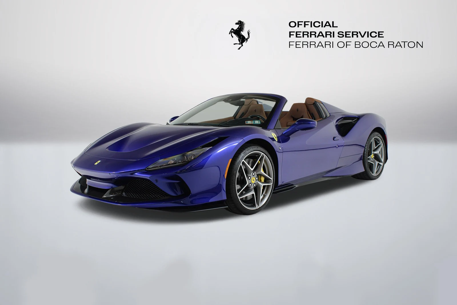 Blu Elettrico 2020 Ferrari F8 Spider in a front three-quarter view