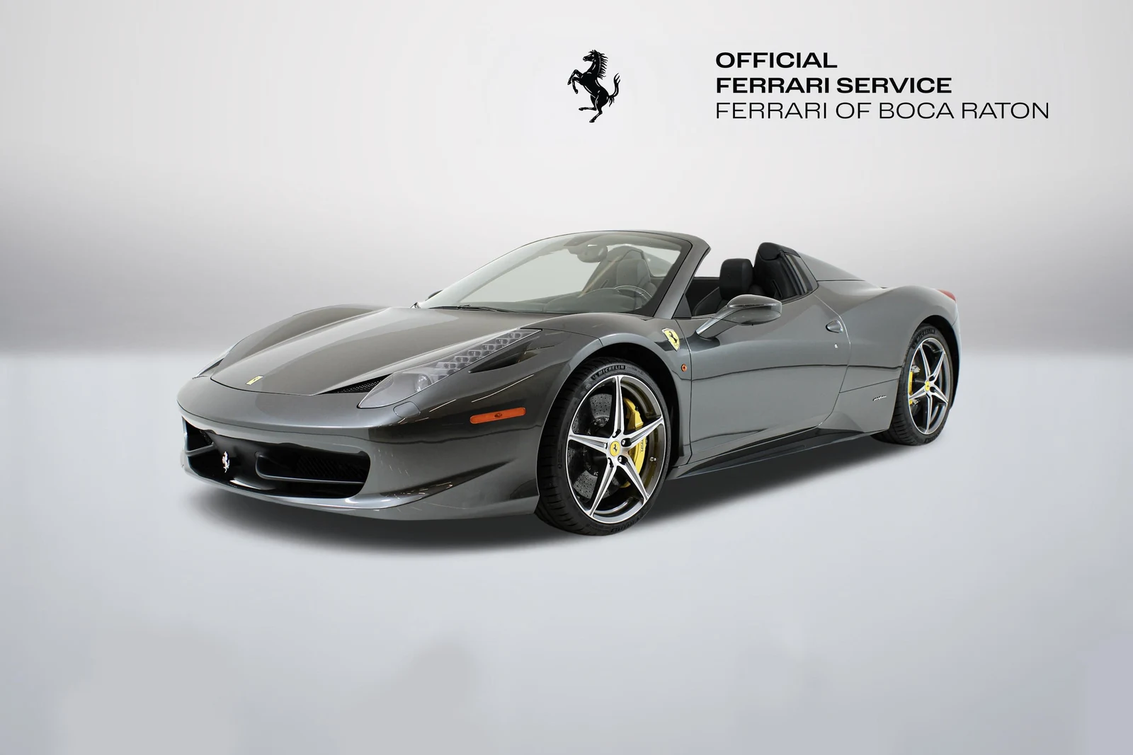 Grigio Silverstone Ferrari 458 Spider in a front three-quarter view