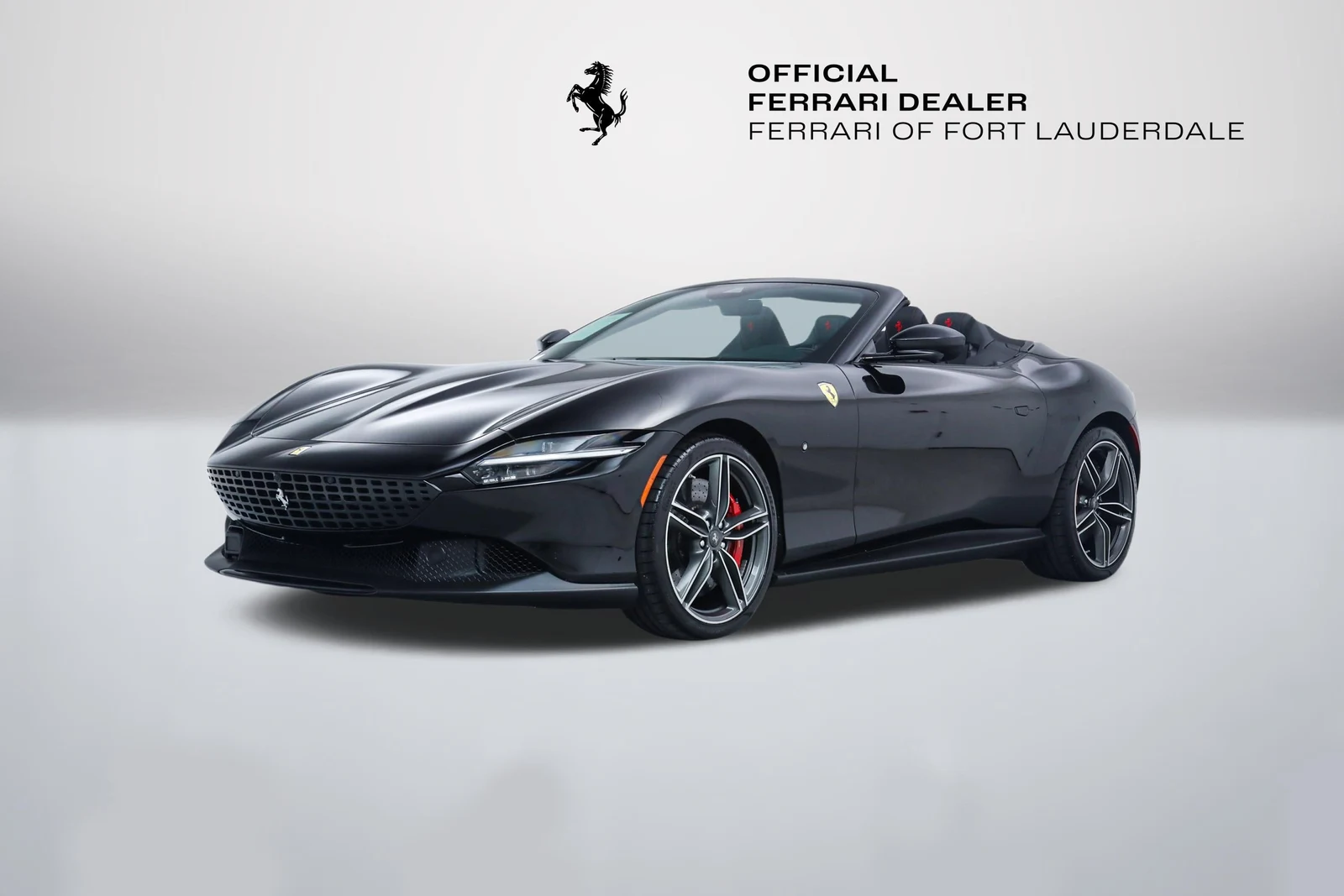 Nero Ferrari Roma Spider in a front three-quarter view
