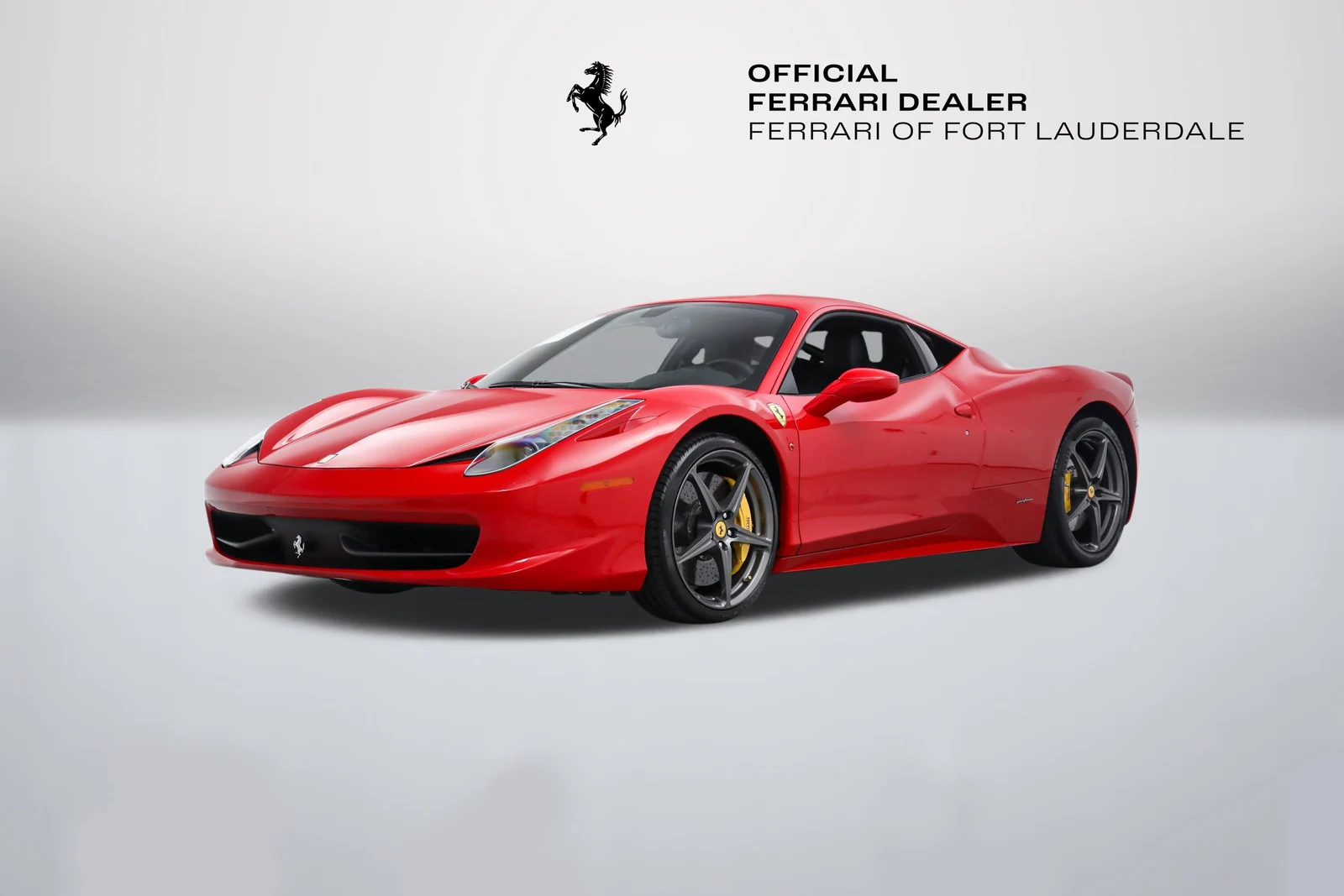 Rosso Corsa Ferrari 458 Italia in a front three-quarter view