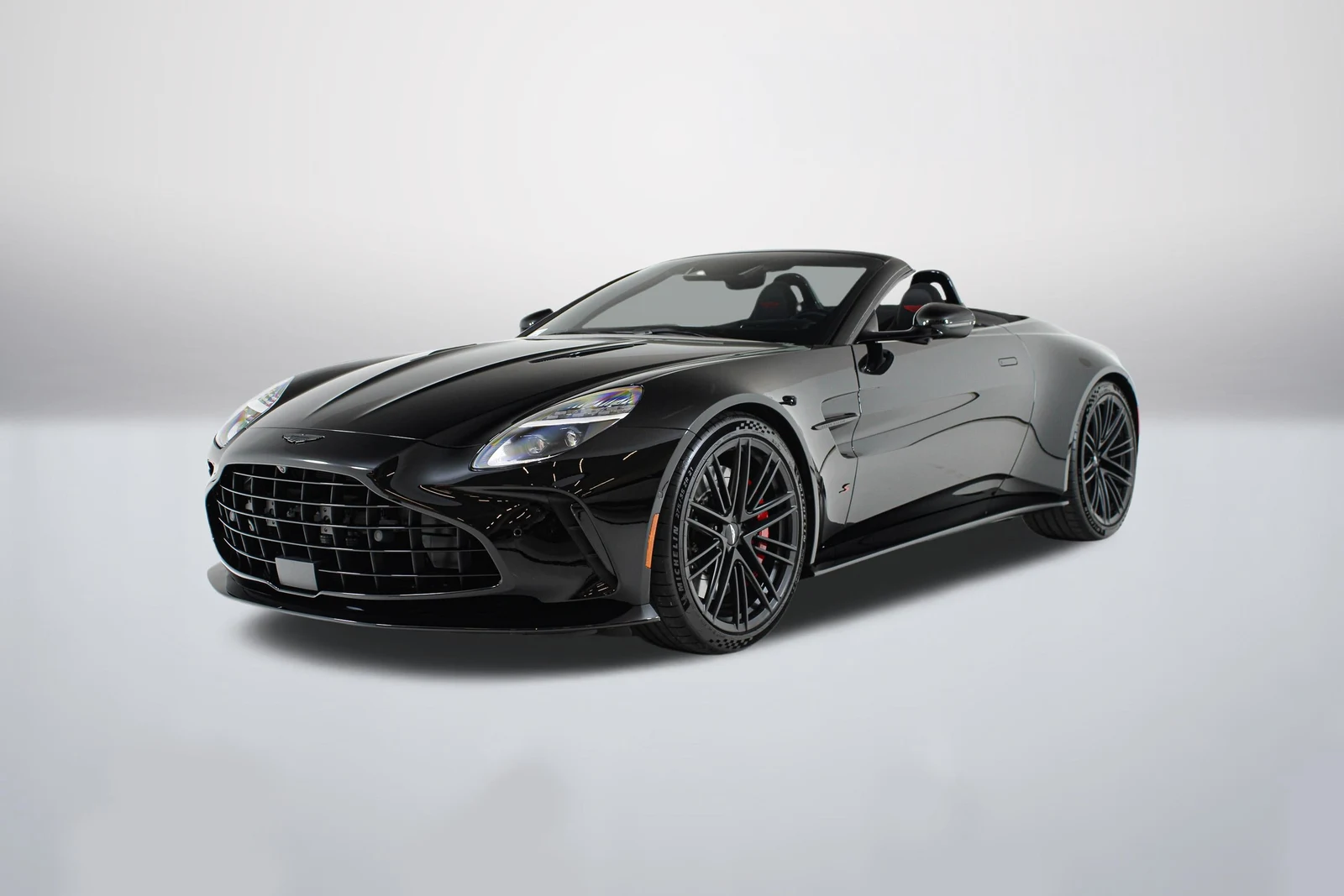 Jet Black Aston Martin Vantage S Roadster (2024 Update) in a front three-quarter view