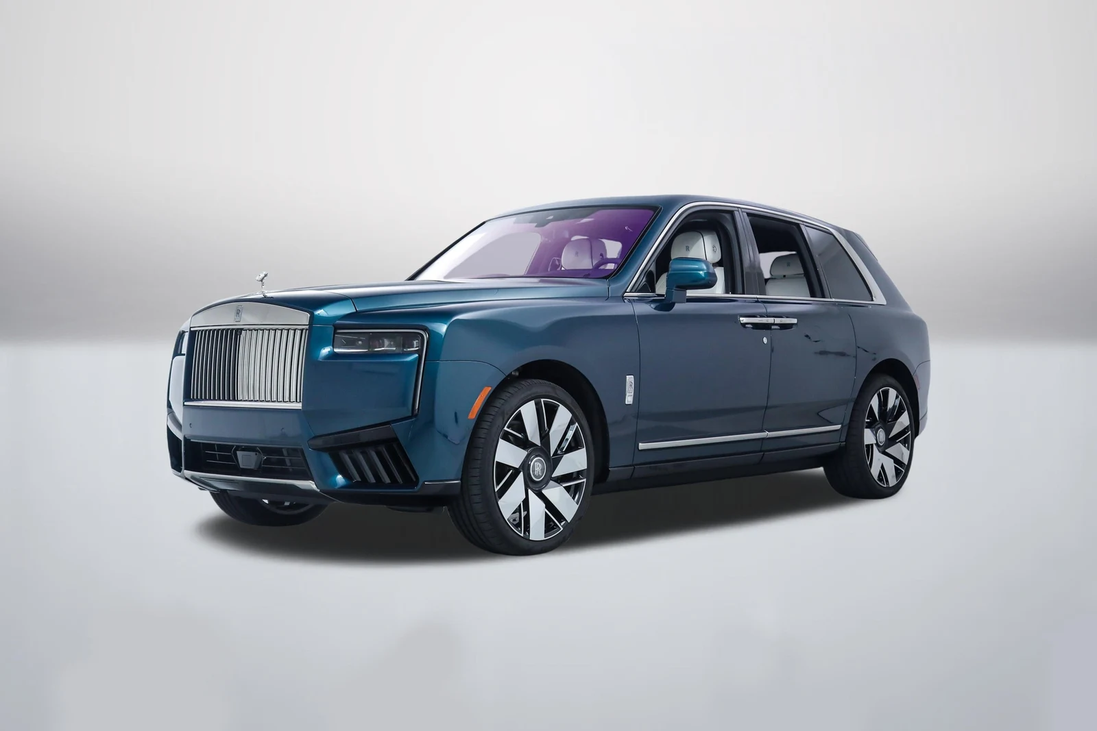 Blue Rolls-Royce Cullinan in a front three-quarter view