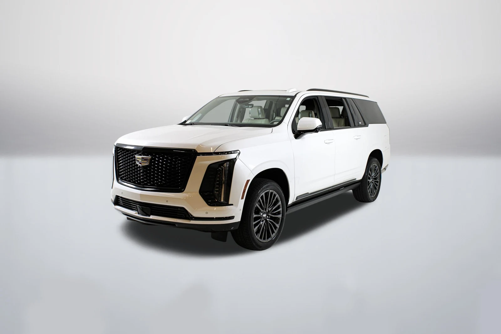 Crystal White Tricoat Cadillac Escalade ESV Sport Platinum (5th Generation) in a front three-quarter view