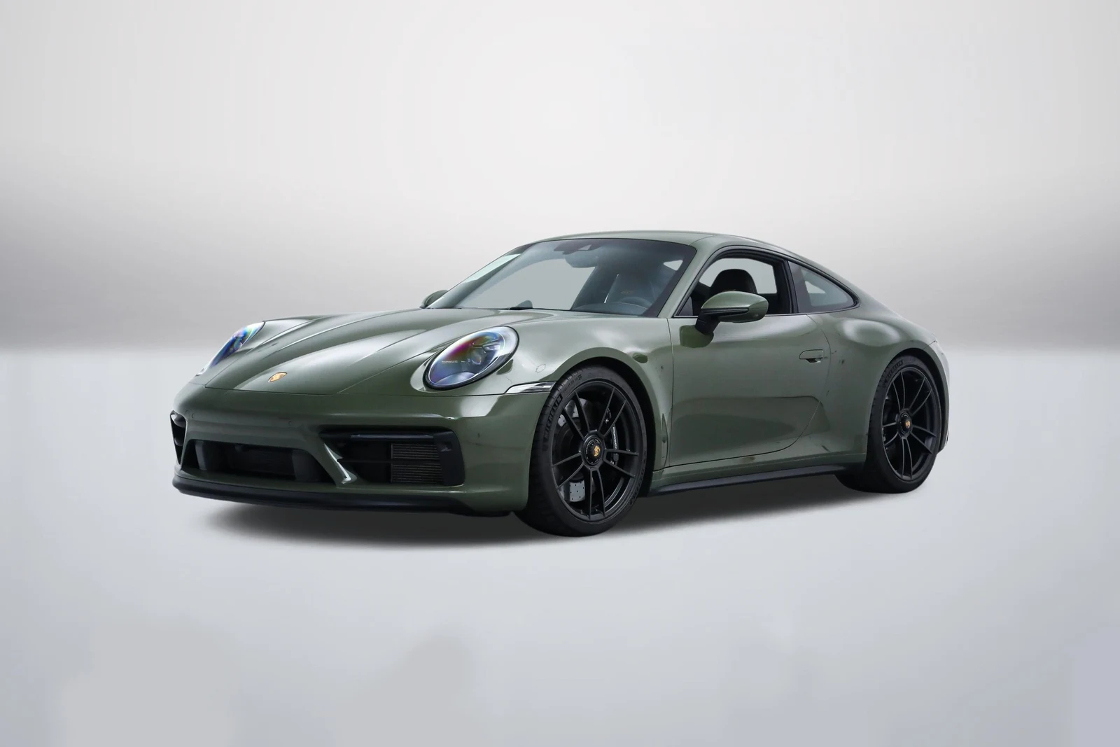 Paint to Sample NATO Olive Porsche 911 (992.1) Carrera GTS in a front three-quarter view