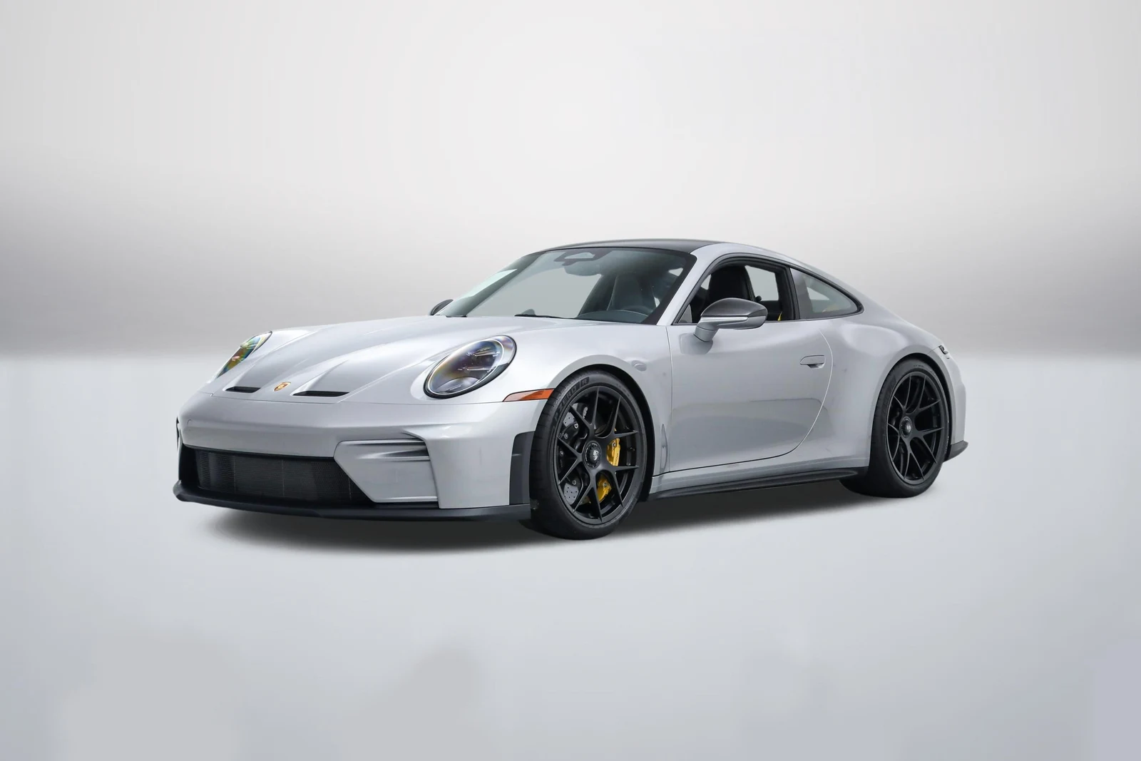 GT Silver Metallic Porsche 911 (992.2) GT3 Touring in a front three-quarter view