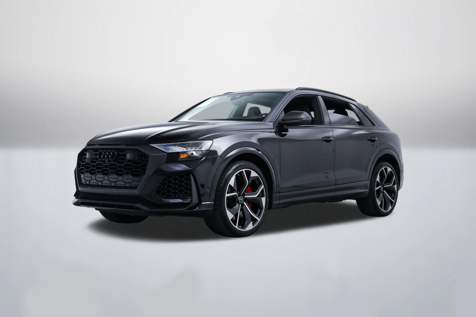 Mythos Black Metallic Audi RS Q8 in a front three-quarter view