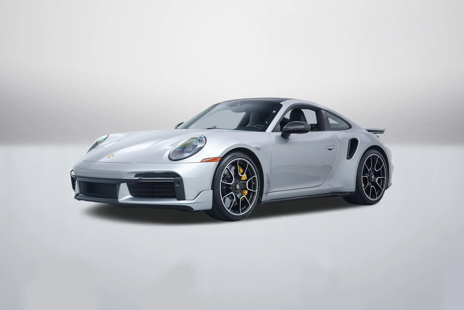 GT Silver Metallic Porsche 911 (992.1) Turbo S in a front three-quarter view