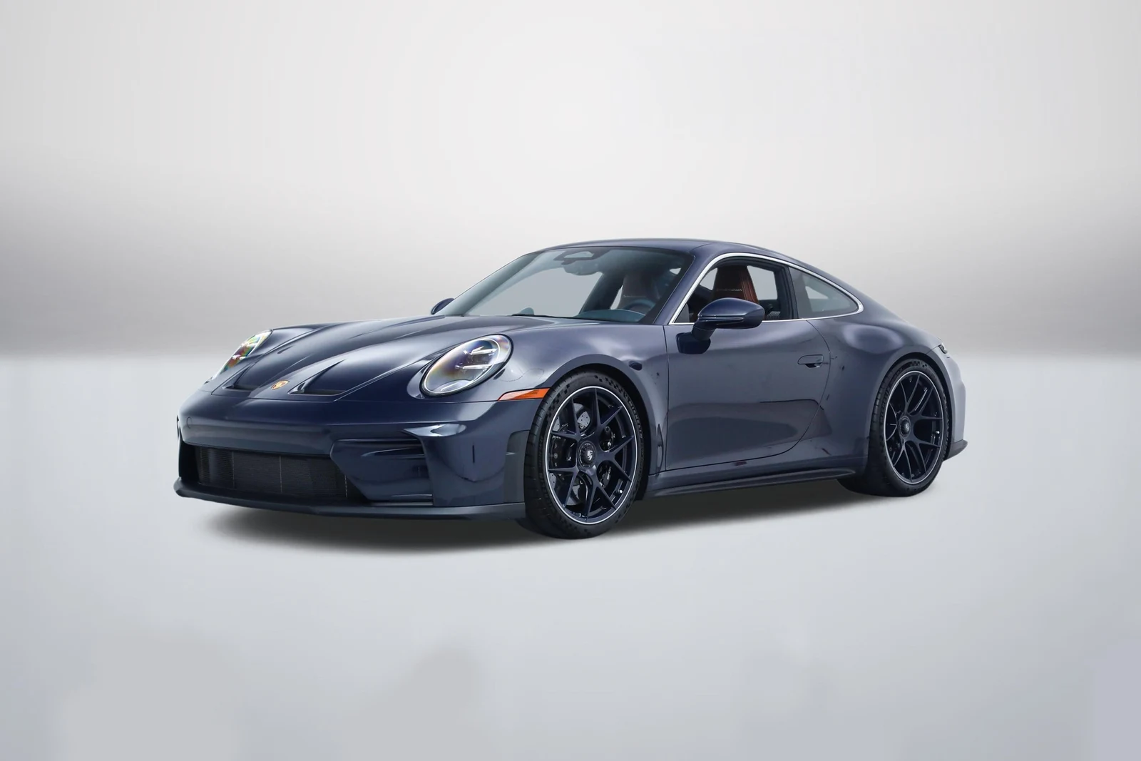 Dark Sea Blue Porsche 911 (992.2) GT3 in a front three-quarter view