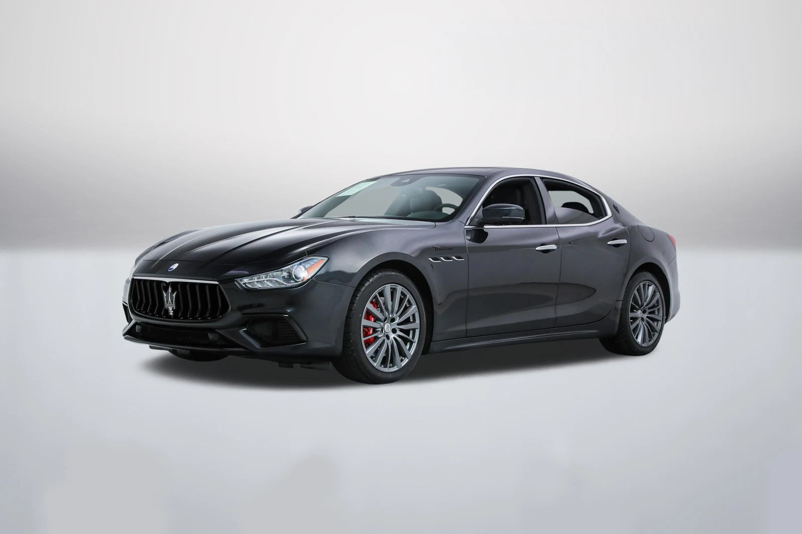Nero Ribelle Maserati Ghibli Modena in a front three-quarter view