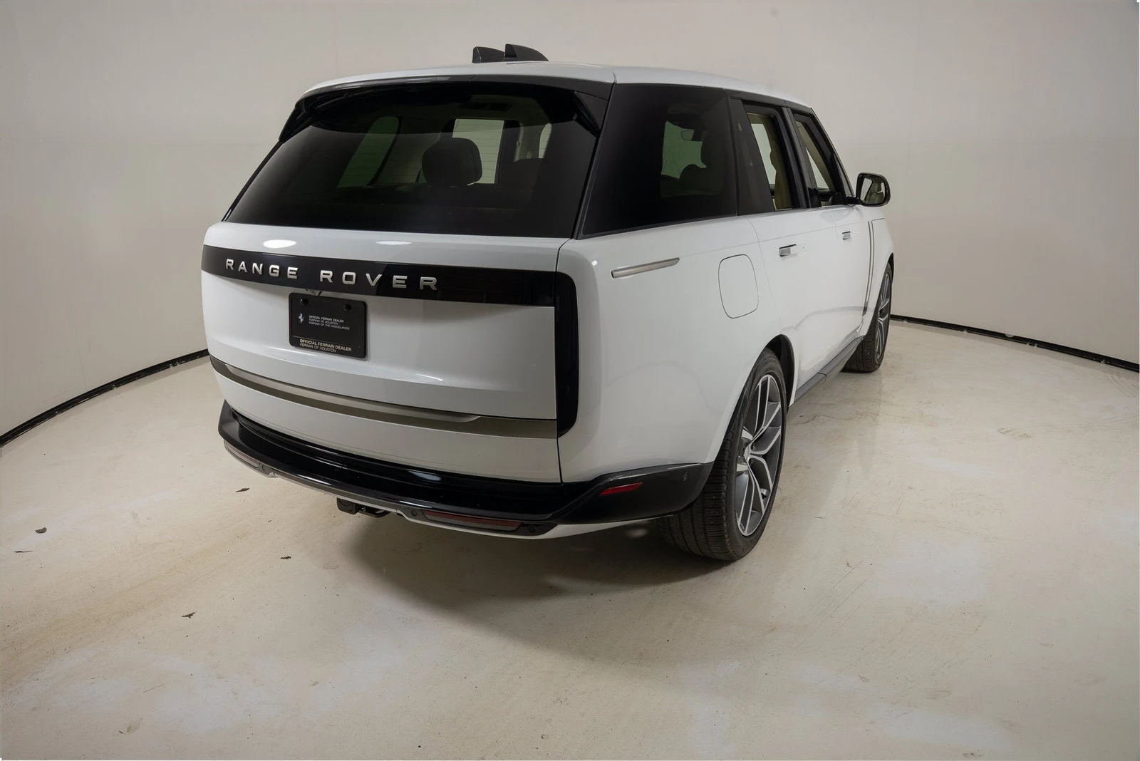 2024 Land Rover Range Rover P400 SE, rear three-quarter view, White