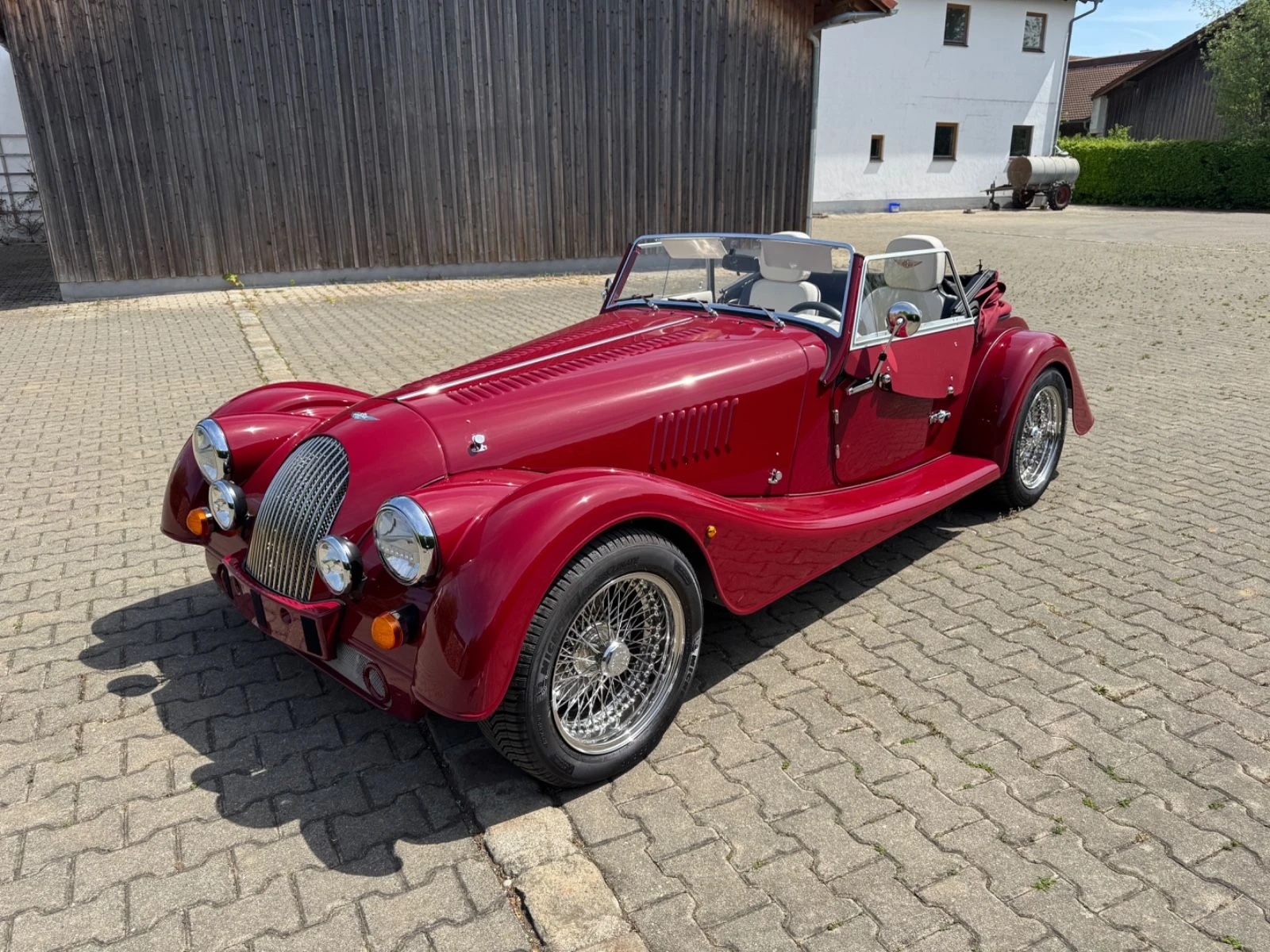 Red Morgan Plus Four, full front three-quarter view