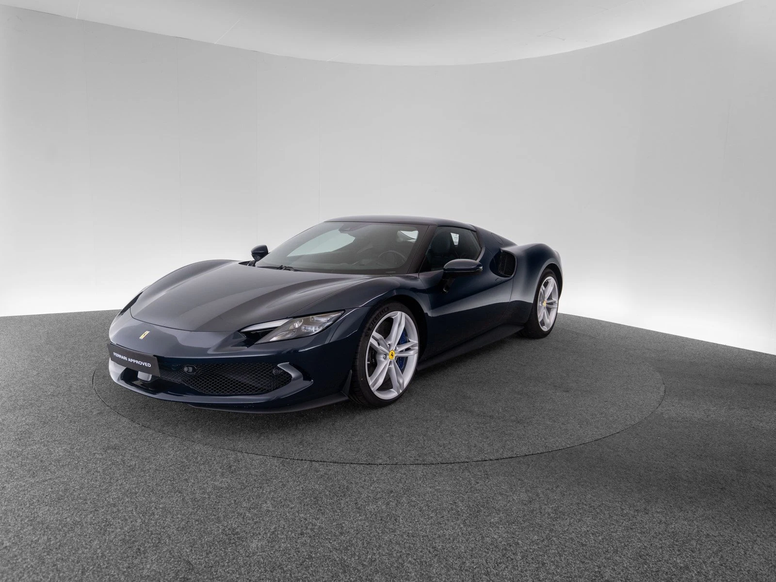 Ferrari 296 GTB, full-car front three-quarter view.