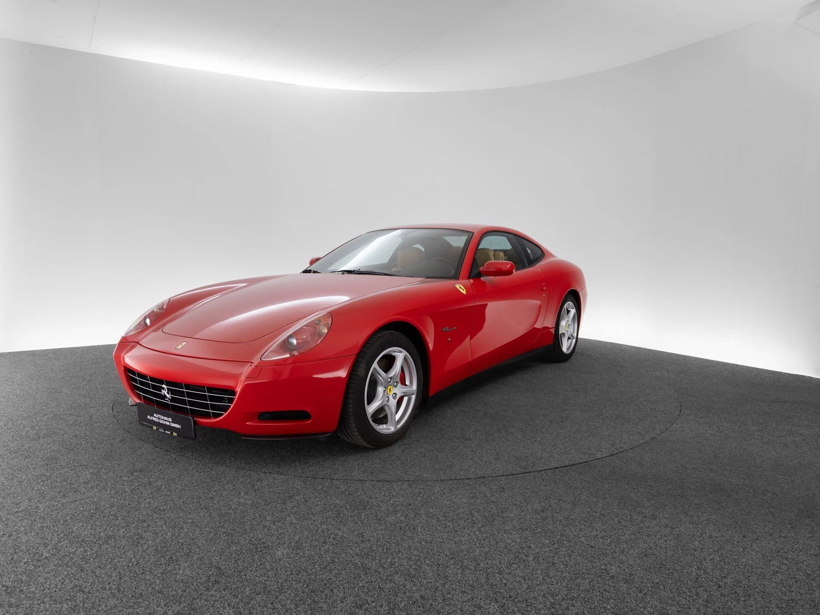 Ferrari 612 Scaglietti, full-car front three-quarter view.
