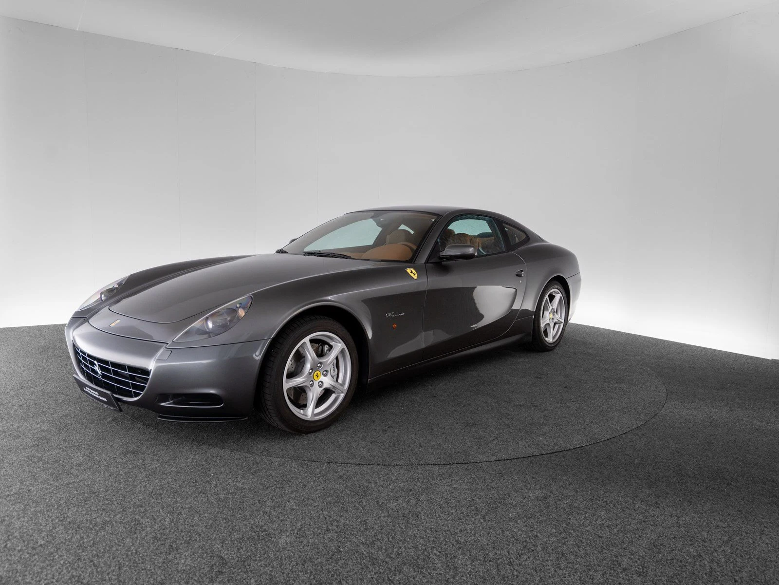 Ferrari 612 Scaglietti, full-car front three-quarter view.