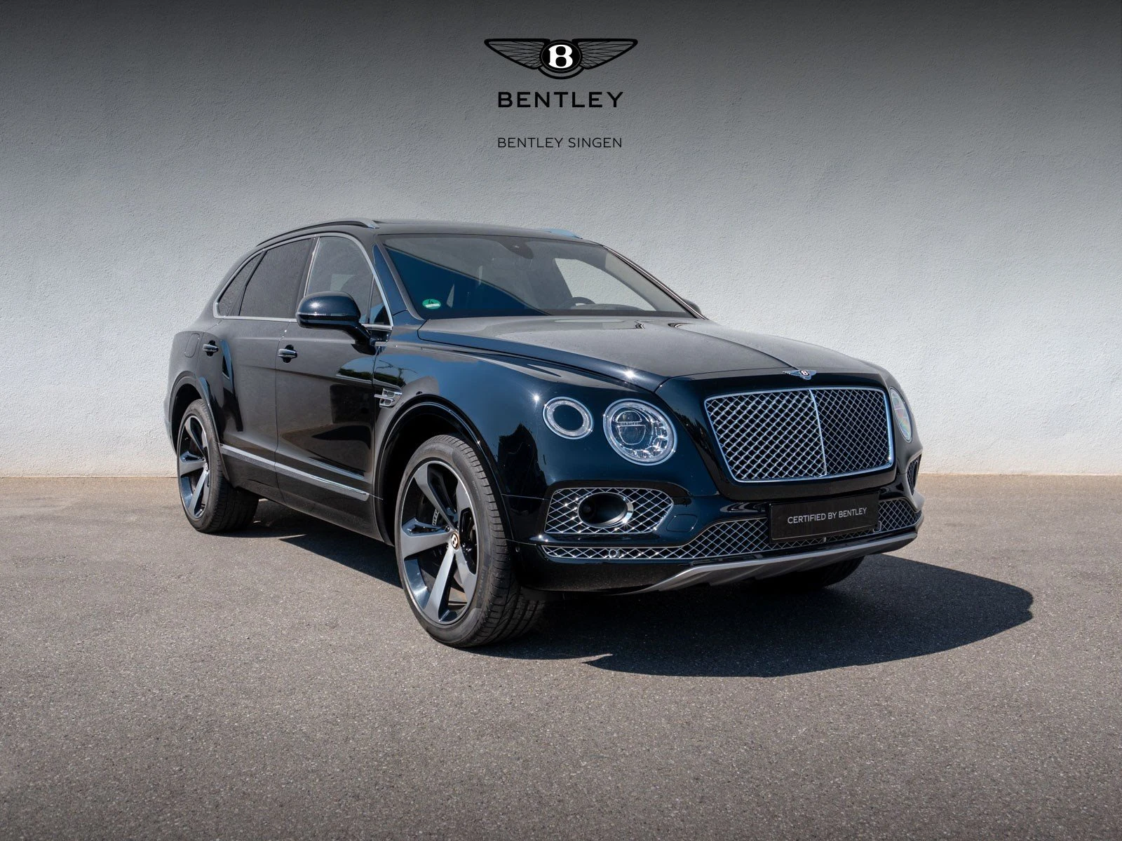 Bentley Bentayga V8, full-car front three-quarter view.