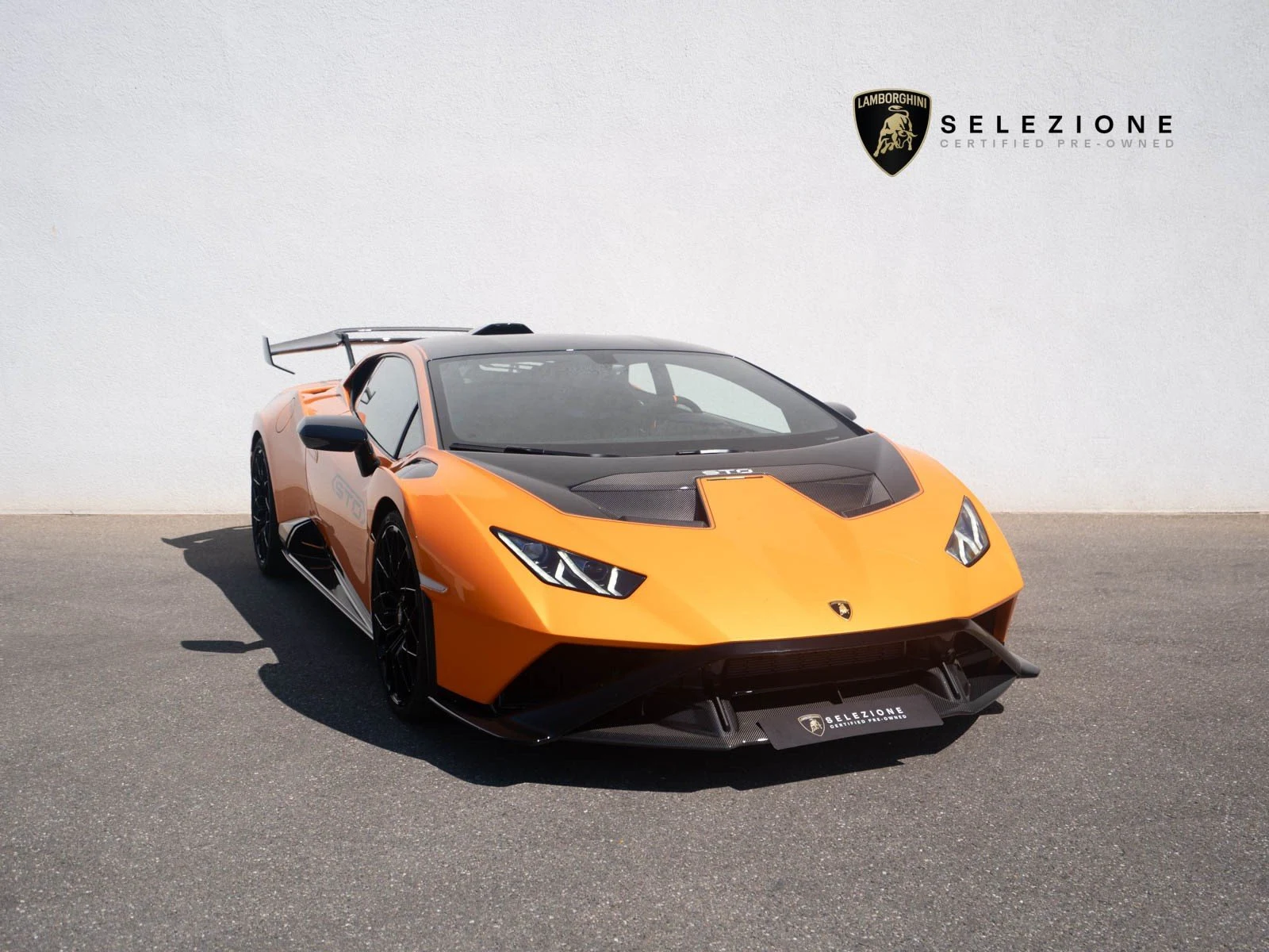 Lamborghini Huracán STO, full-car front three-quarter view.