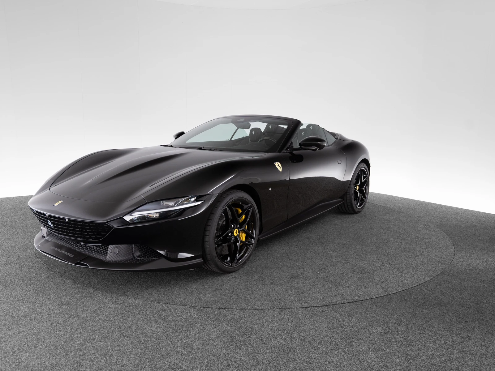 Ferrari Roma Spider, full-car front three-quarter view.