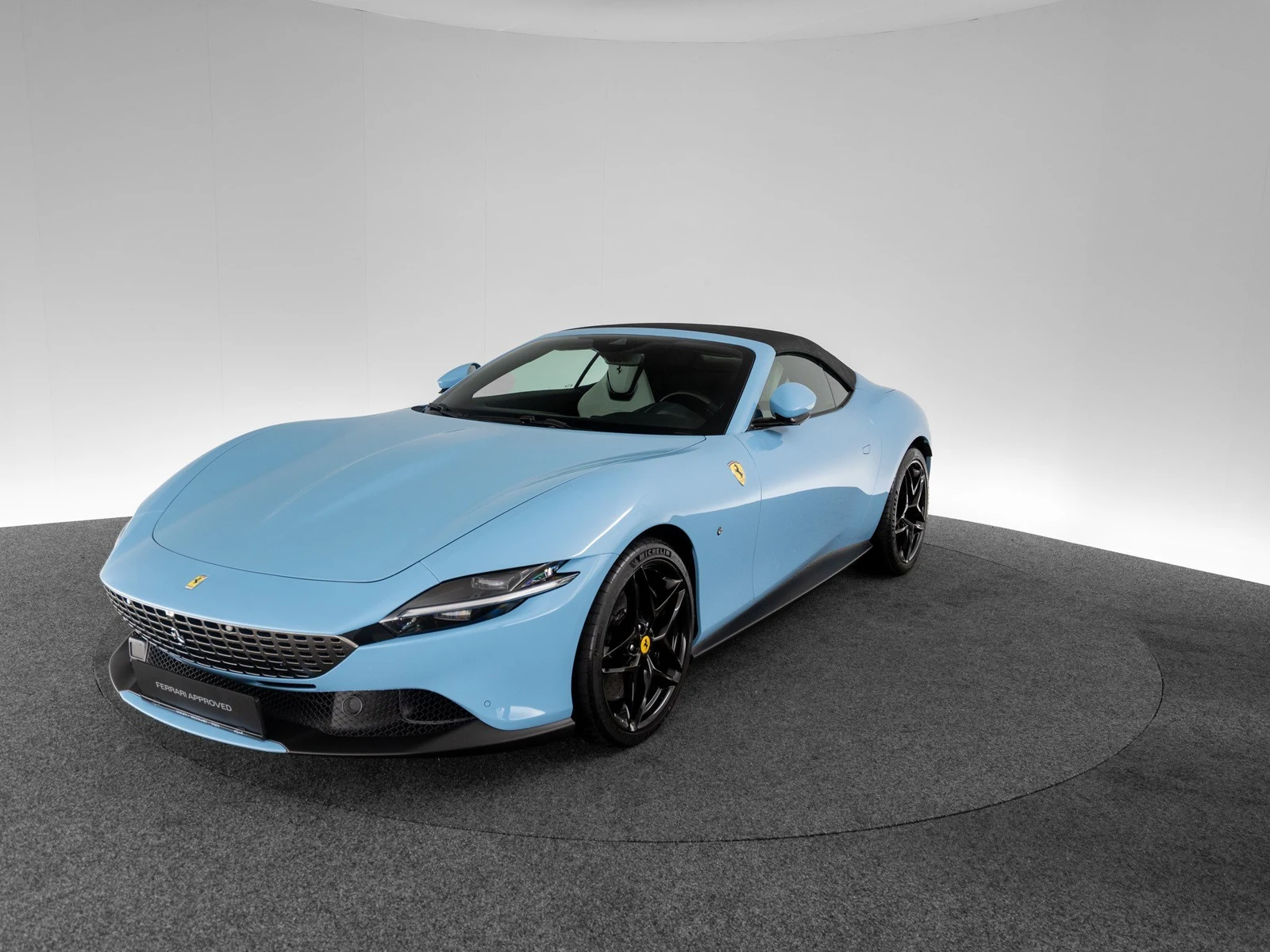 Ferrari Roma Spider, full-car front three-quarter view.