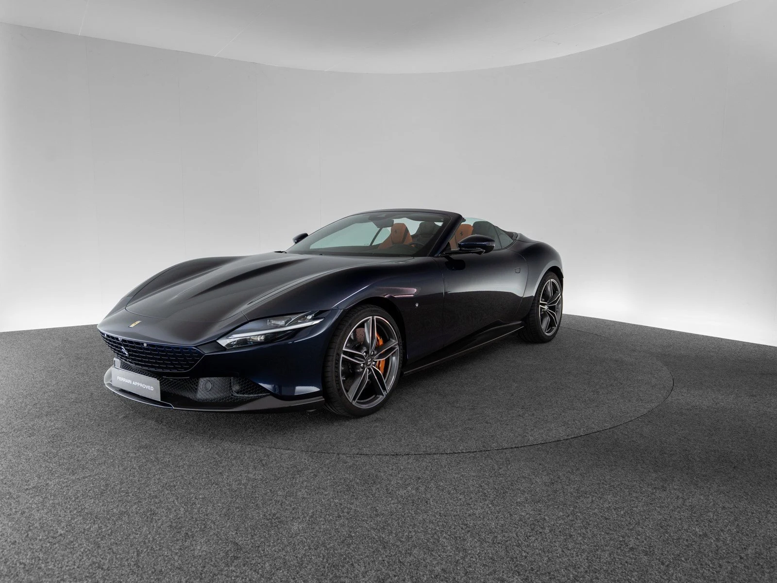 Ferrari Roma Spider, full-car front three-quarter view.