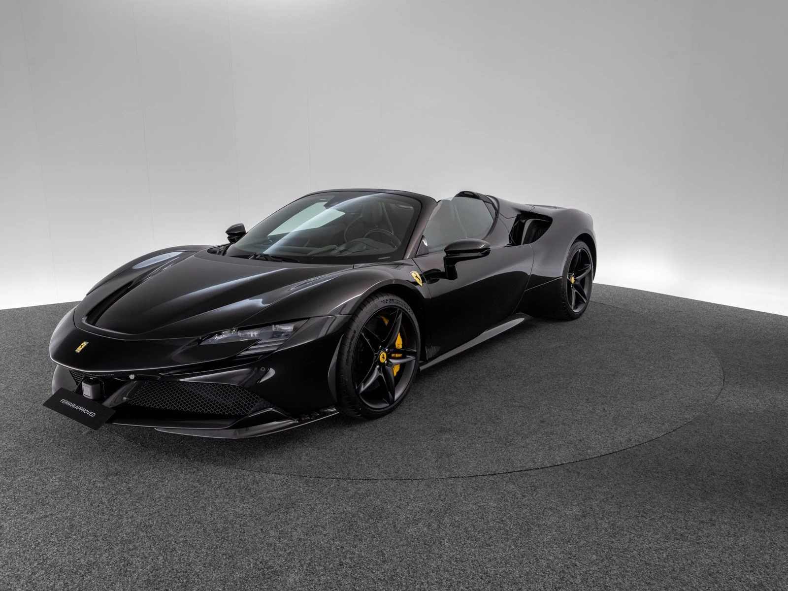 Ferrari SF90 Spider, full-car front three-quarter view.