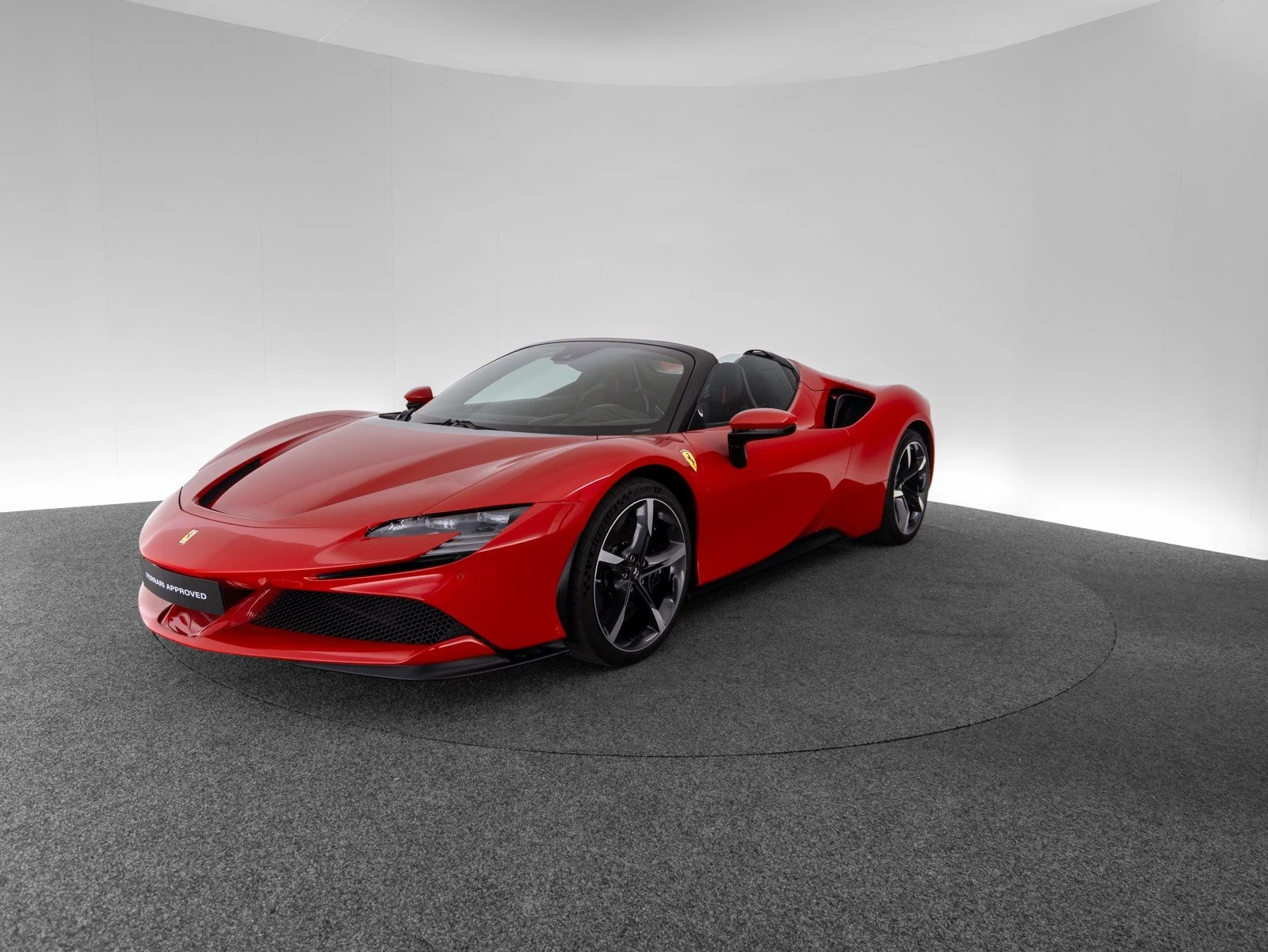 Ferrari SF90 Spider, full-car front three-quarter view.