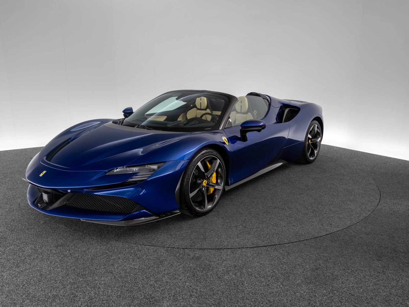 Ferrari SF90 Spider, full-car front three-quarter view.