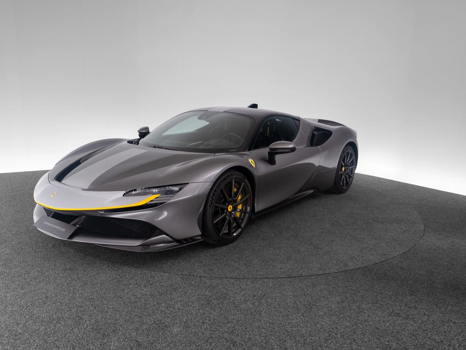 Ferrari SF90 Stradale Assetto Fiorano, full-car front three-quarter view.