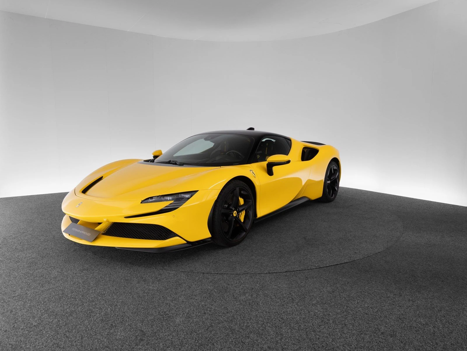 Ferrari SF90 Stradale, full-car front three-quarter view.