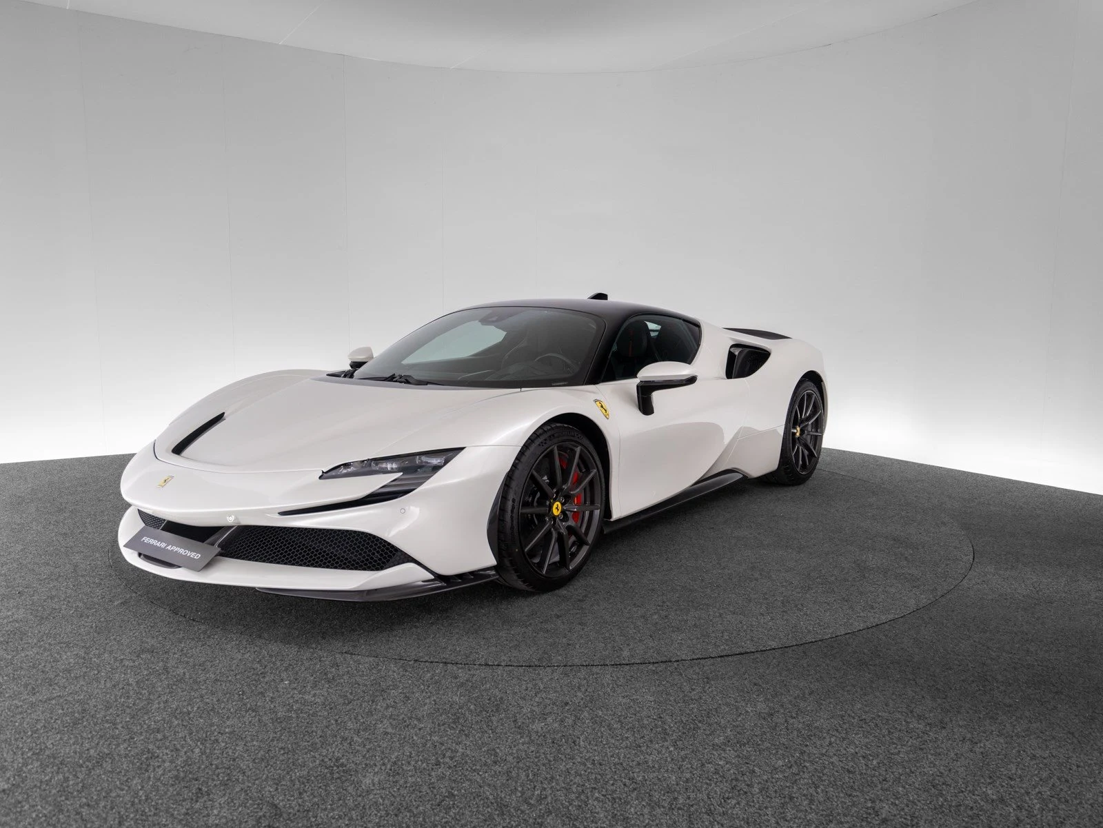 Ferrari SF90 Stradale Assetto Fiorano, full-car front three-quarter view.