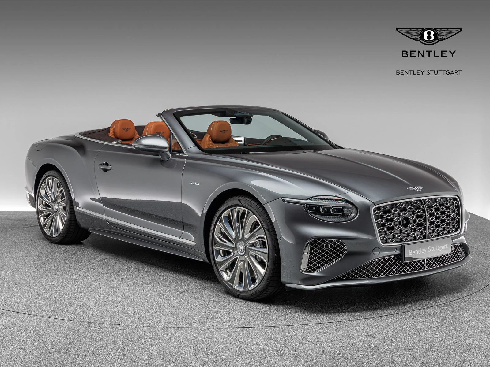 Bentley Continental GTC Mulliner, full-car front three-quarter view.