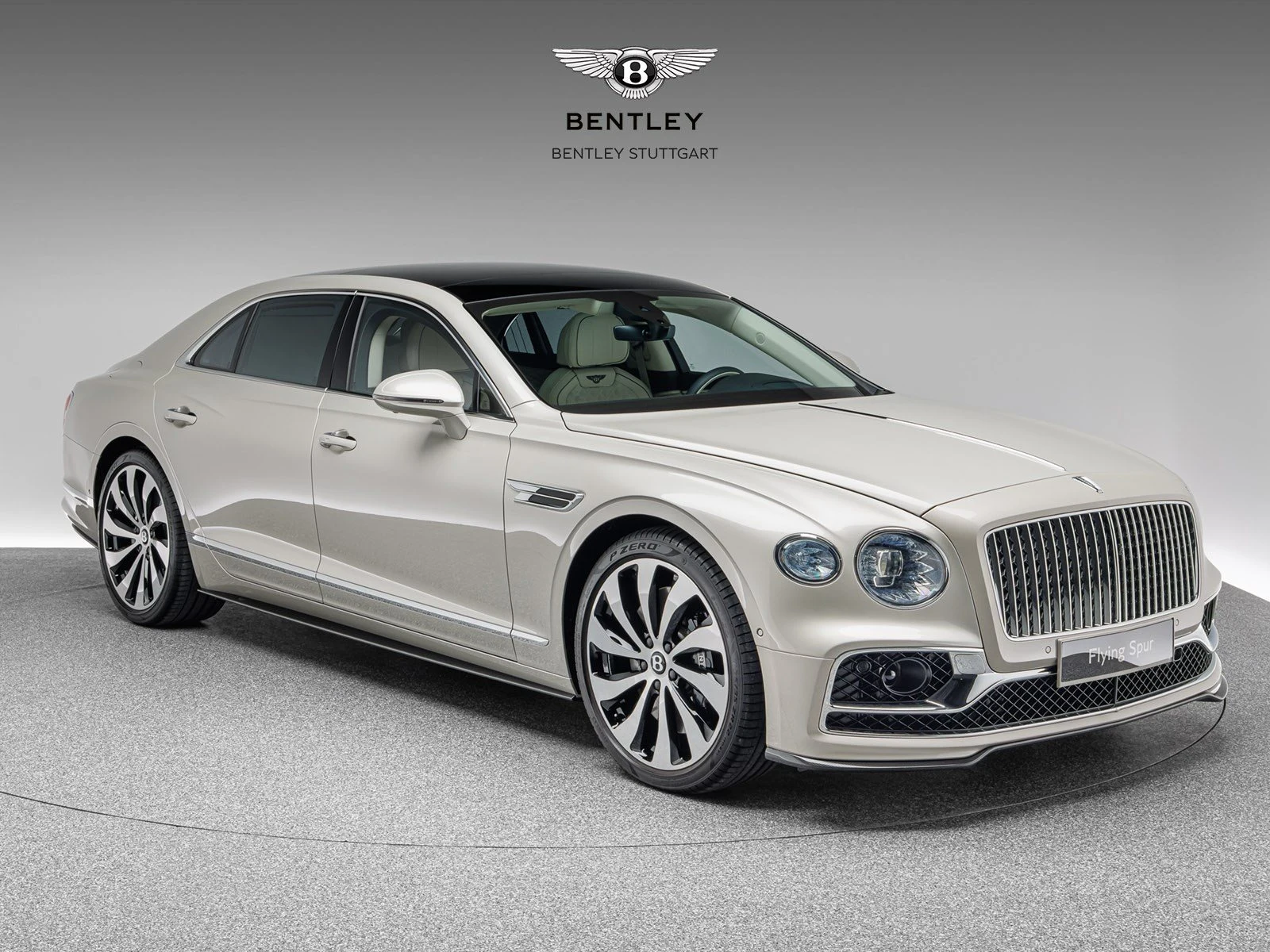 Bentley Flying Spur V8, full-car front three-quarter view.
