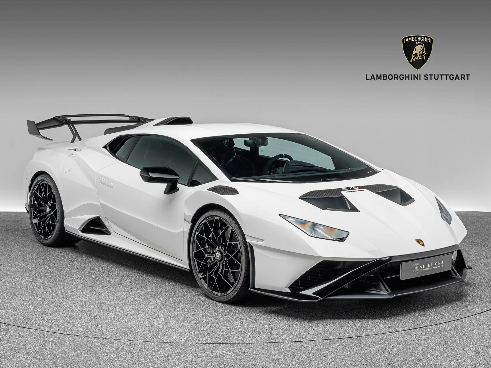 Lamborghini Huracán STO, full-car front three-quarter view.