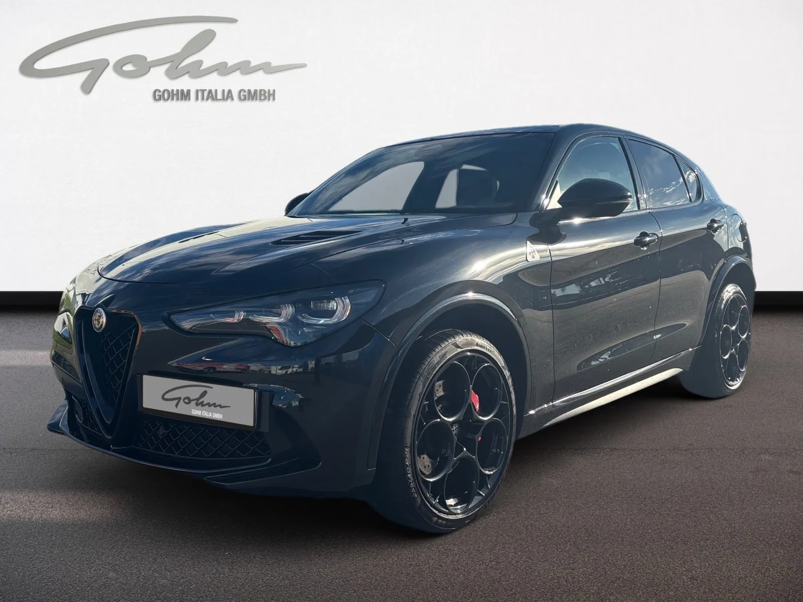 Alfa Romeo Stelvio Quadrifoglio Q4, full-car front three-quarter view.