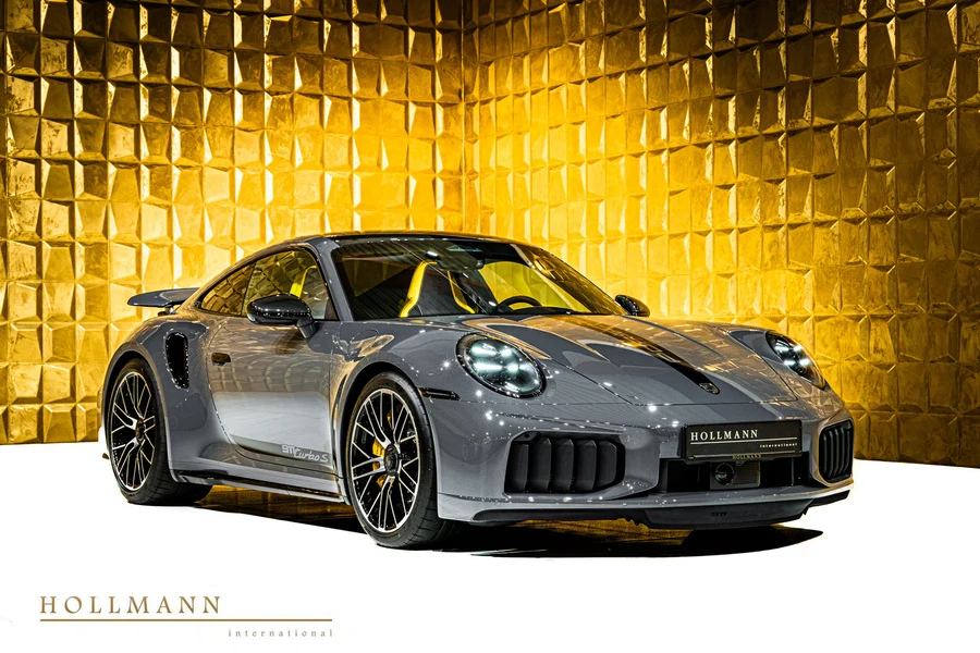 Slate Grey Neo Porsche 911 Turbo S (992.2), front three-quarter view.
