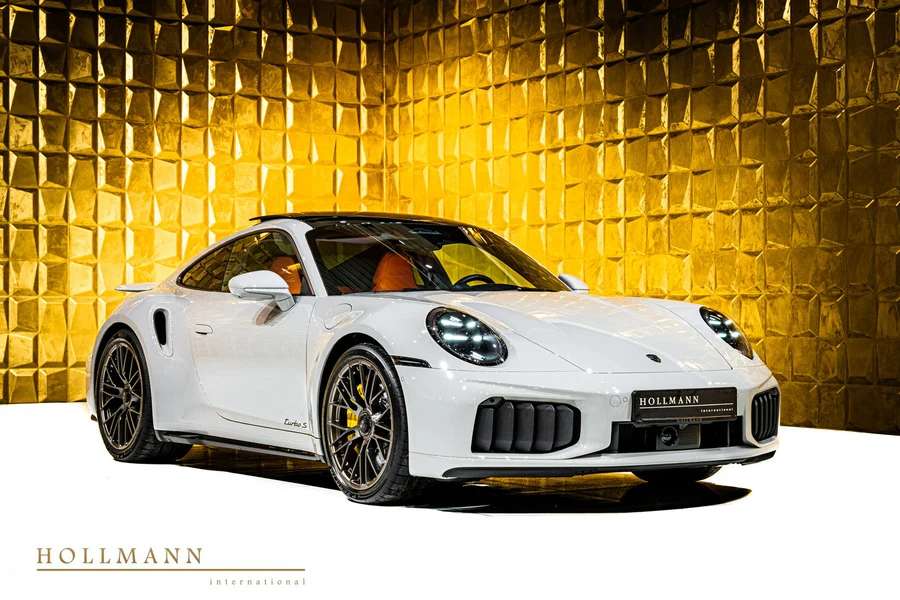 Chalk Porsche 911 Turbo S (992.2), front three-quarter view.