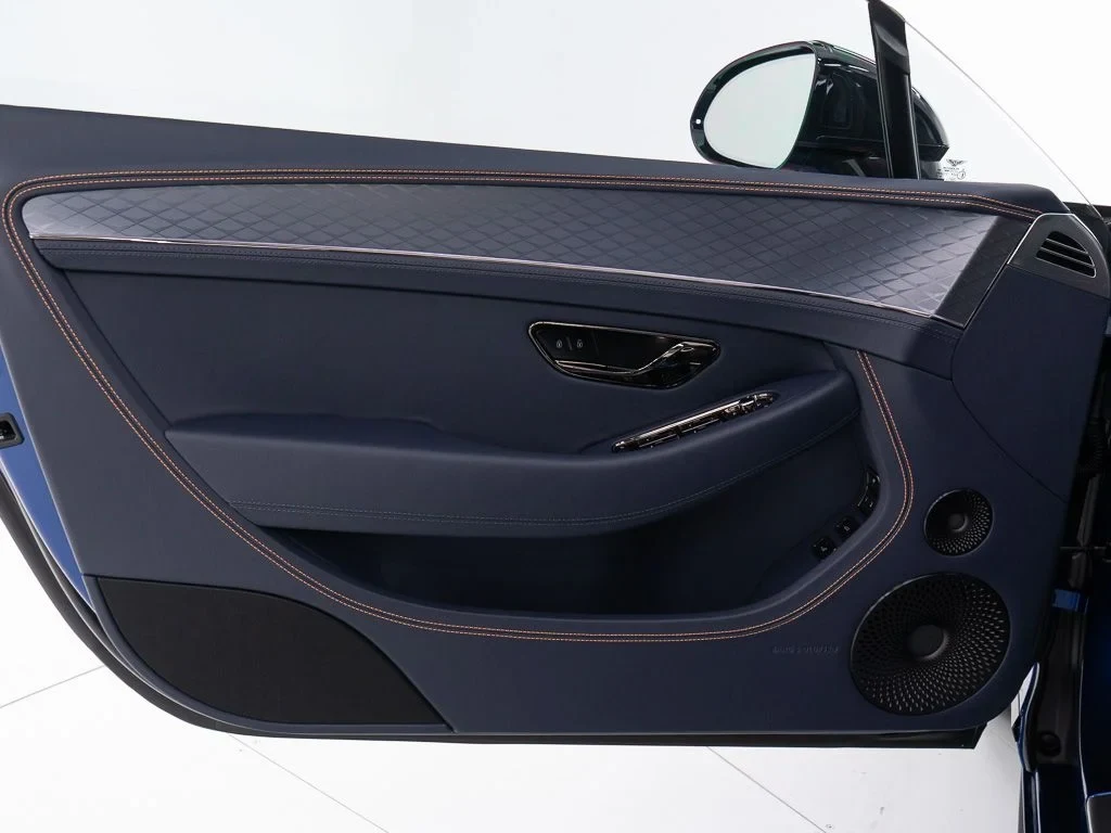 2026 Bentley Continental GT S interior, door panel, Imperial Blue / Mandarin - by Mulliner