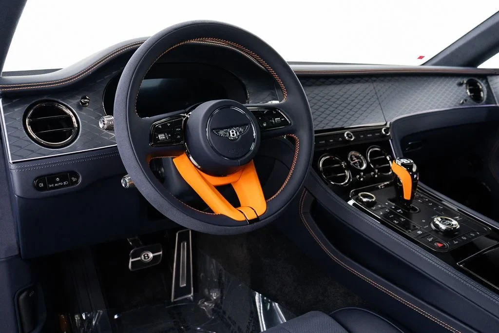 2026 Bentley Continental GT S interior, dashboard, Imperial Blue / Mandarin - by Mulliner