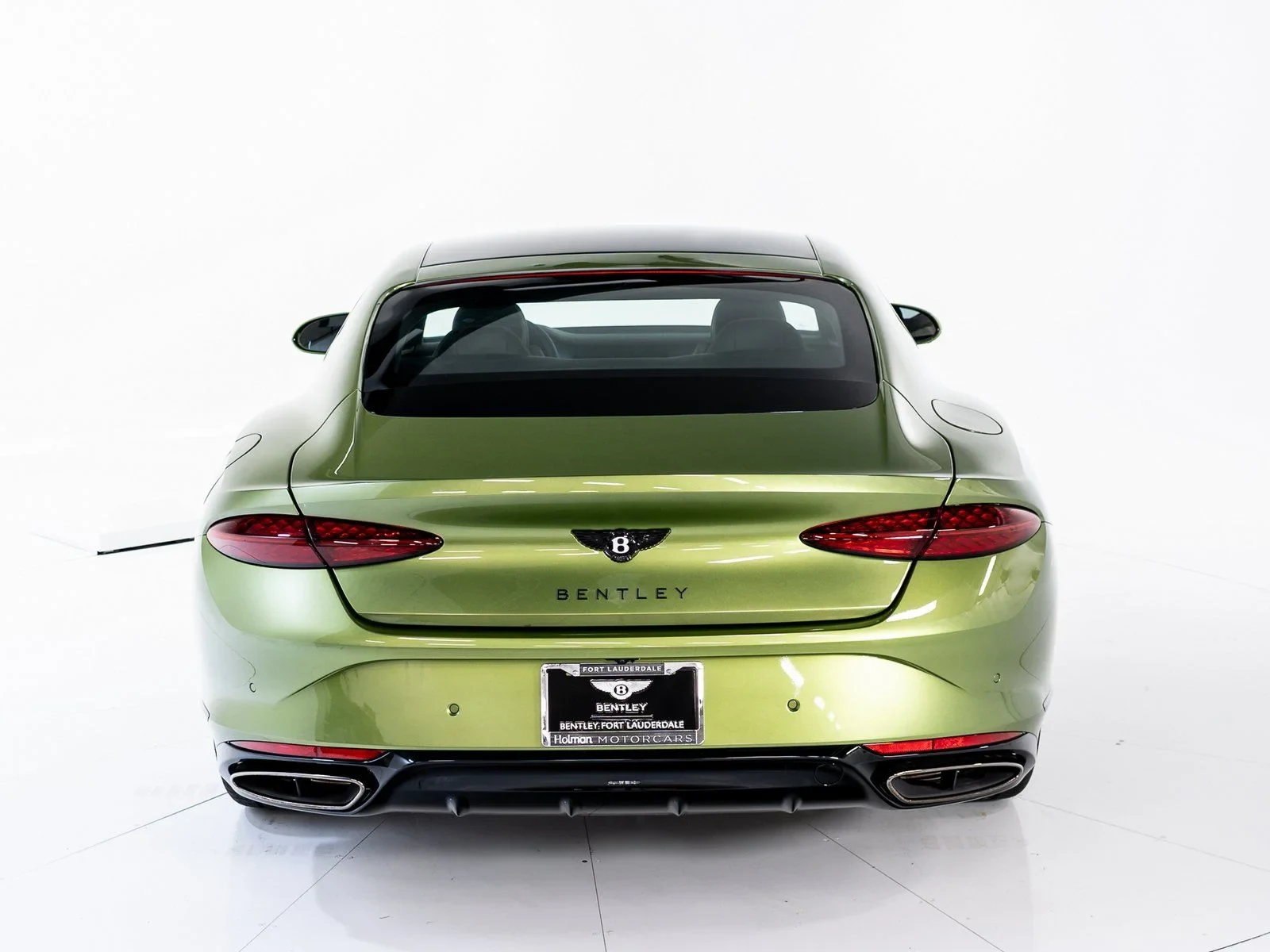 2026 Bentley Continental GT Azure, rear three-quarter view, Tourmaline Green - by Mulliner