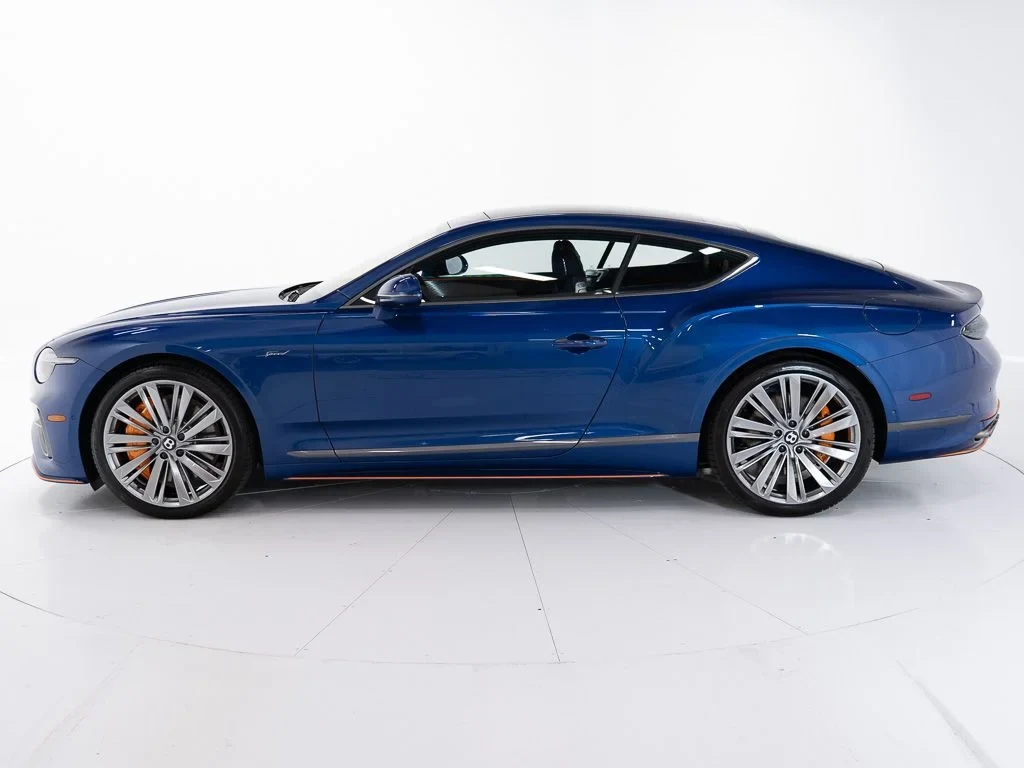 2026 Bentley Continental GT Speed, side profile, Moroccan Blue w/Pinstripe in Mandarin