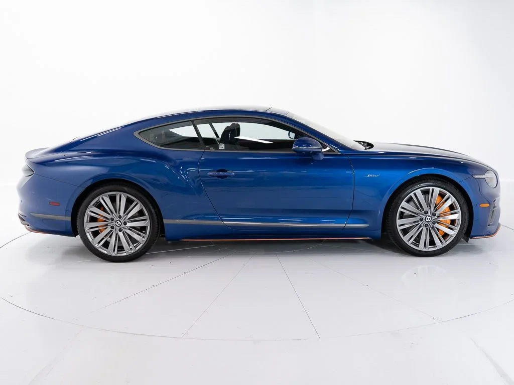 2026 Bentley Continental GT Speed, side profile, Moroccan Blue w/Pinstripe in Mandarin