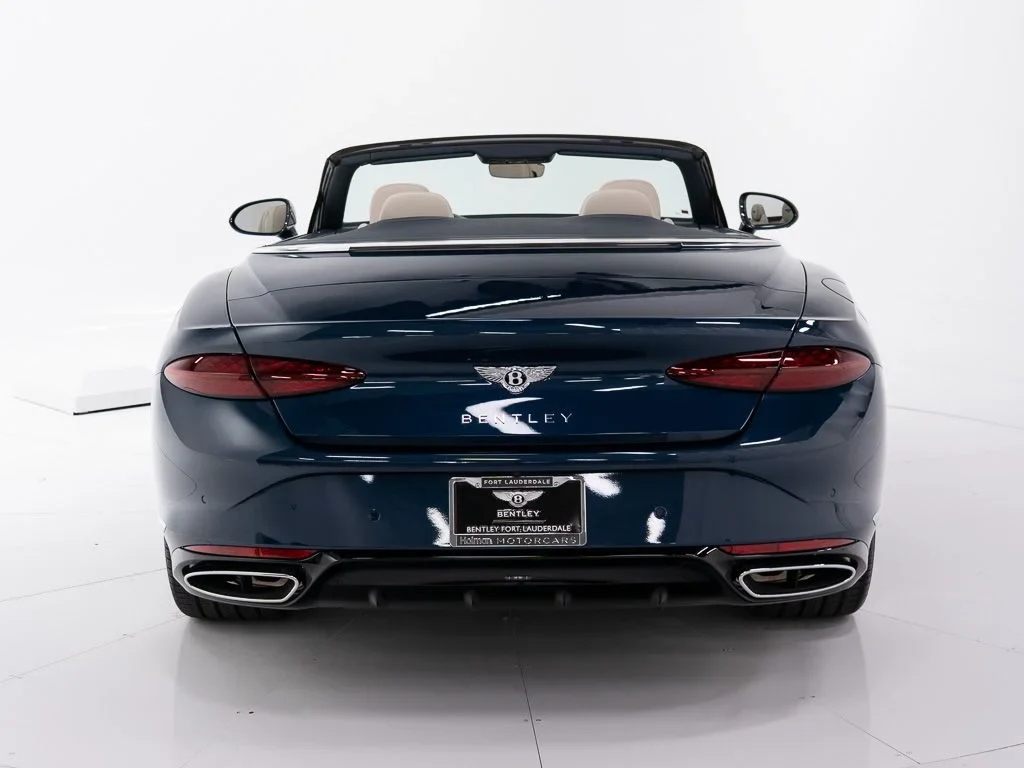 2026 Bentley Continental GTC, rear three-quarter view, Windsor Blue