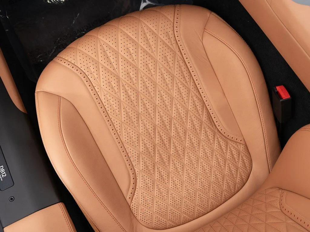 2026 Aston Martin DB12 Volante interior, seats, Onyx Black / Copper Tan Metallic
