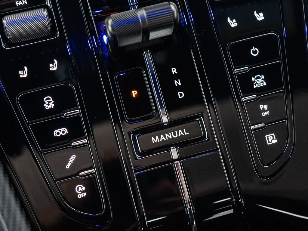 2026 Aston Martin DB12 S interior, center console, Dark Knight w/Stitching in Spicy Red